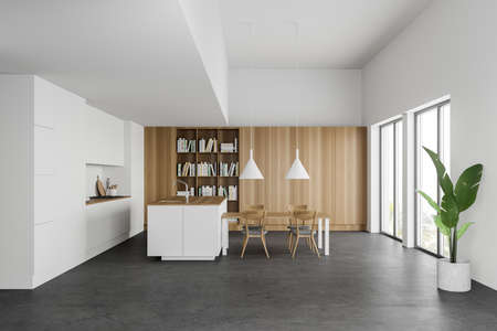 Interior of modern kitchen with white and wooden walls, concrete floor, white countertops,...