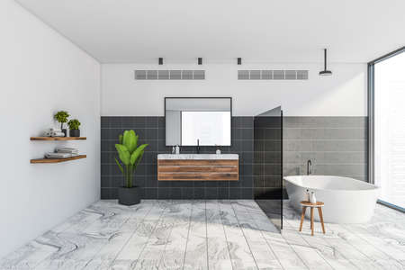 Interior of luxury bathroom with white and black walls, marble floor, comfortable bathtub and double...