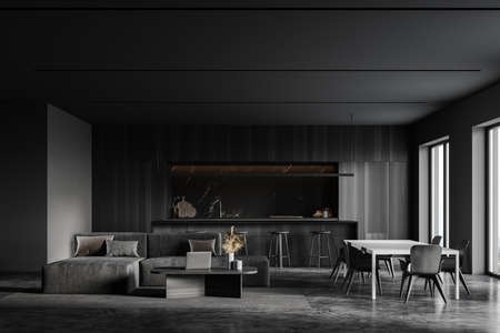 Interior of stylish kitchen with gray and marble walls, concrete floor, bar with stools, dining...