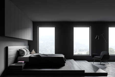 Side view of stylish bedroom with gray walls, concrete floor, comfortable master bed and armchair. Windows with blurry view. 3d renderingの写真素材