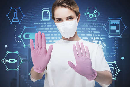 Beautiful young businesswoman in protective mask and rubber gloves showing stop sign standing in...