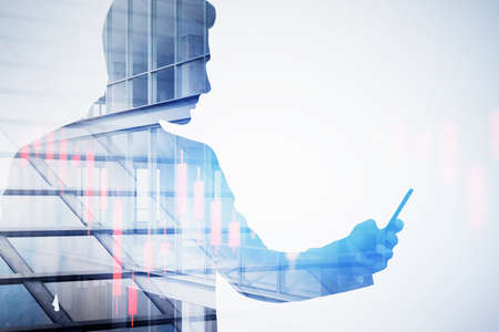 Unrecognizable businessman using smartphone in city