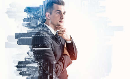 Side portrait of pensive young European businessman standing in blurry city. Concept of leadership...