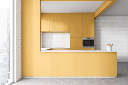 Interior of modern kitchen with white walls, concrete floor and yellow cupboards. Window with blurry cityscape. 3d renderingの写真素材