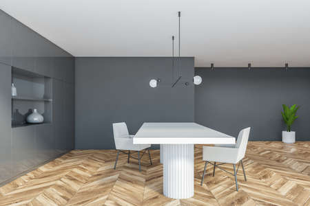 Side view of stylish kitchen with gray walls, wooden floor and white dining table. 3d rendering
