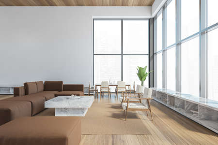 Modern office waiting area with brown armchairs and sofa, a marble coffee table, wooden parquet....