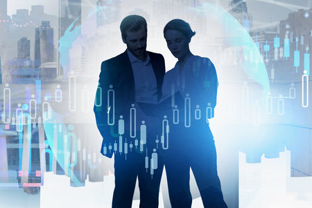 Businessman and businesswoman researching the analytics to predict stock market behavior. Forex chart and New York on background. Elements of this image furnished by NASA. Double exposureの写真素材