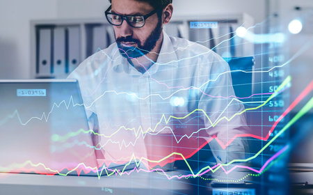 Businessman or stock trader analyzing stock graph chart by fibonacci indicator, side view business...