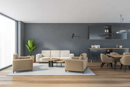 Gray living room with beige sofa and armchairs, coffee table on carpet, parquet floor. Living room...