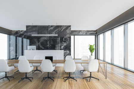 Empty office conference meeting room with reception desk computer and marbel wall, wooden parquet. Panoramic windows. City view. 3d renderingの写真素材