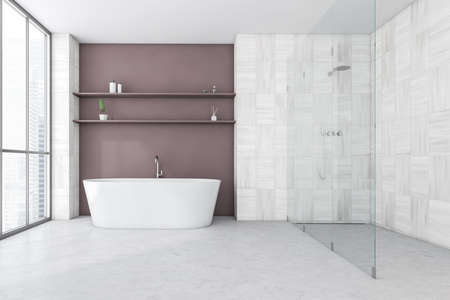 White and pink bathroom with glass shower and white bathtub on marble floor, gels and plant....