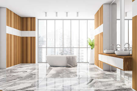 White and wooden bathroom with two washbasins, gray tiled. Wooden shelf and windows with view on...
