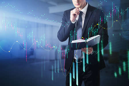 Businessman, trader checking his previous prediction about stock market behavior, forecast and...