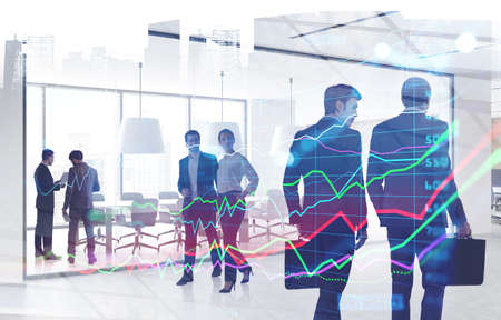 Double exposure of business people chatting and conduct meeting at office workspace. Stock exchange rates forecasting and financial charts. New York on background.の写真素材