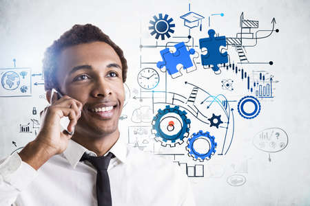 Businessman smiling talking on the smartphone, drawing with analytical thinking icons, graph, system...