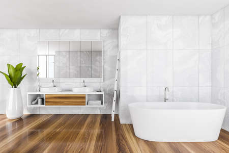 Light luxury interior with white bathtub and towel on a ladder, two sinks with drawer and mirror,...