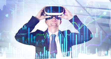 Businessman in suit and eyeglasses looking for information, double exposure of business buildings....