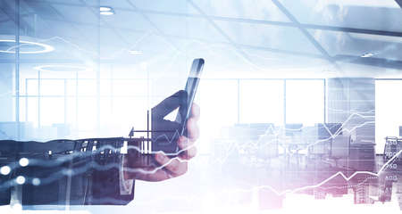 Office worker hand with business manager room, stock market changes, in black suit. Concept of...