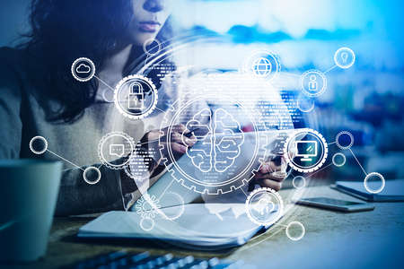 Office manager with electronic device, glowing hud with brain and corporate symbols. Cloud, gears and personal information. Concept of creativity and brainstormingの写真素材