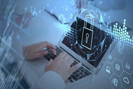 Office man typing on keyboard of laptop, lock icon with network symbols double exposure. Business...