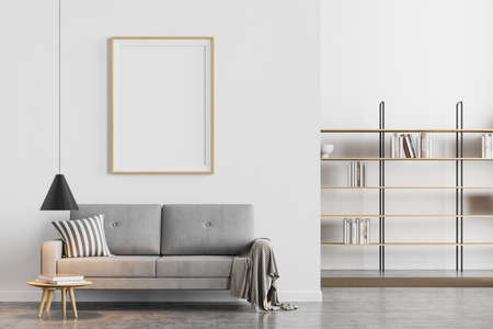 Bright modern living room interior with empty poster on the white wall, comfortable gray sofa and bookcase. Luxury marble floor. Scandinavian minimalist creative design. Mock up. 3d rendering.の写真素材