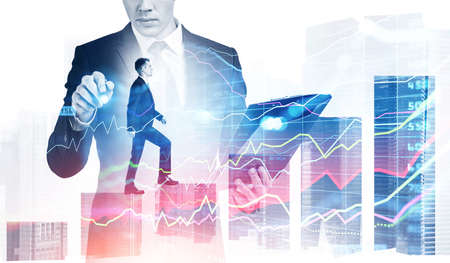Businessman hand with pen point at virtual screen hud, colorful stock market changes, man walking on bar chart. Double exposure with business skyscrapers. Concept of growth and financial successの写真素材
