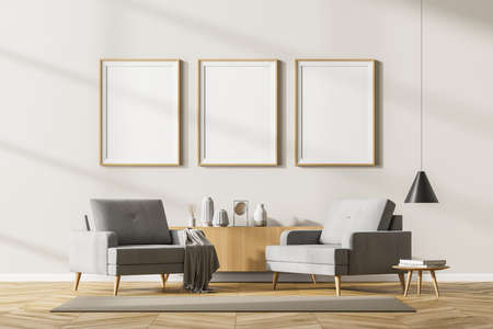 Modern living room interior with two vintage armchairs and coffee table with books, reading room on...