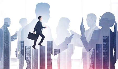 Group of business people communicate with each other, cooperate and work together. Businessman is walking over the city skyscraper. Concept of teamwork and cooperation in corporate between colleaguesの写真素材