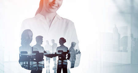Office woman standing with arms crossed, silhouettes of diverse business people working together,...