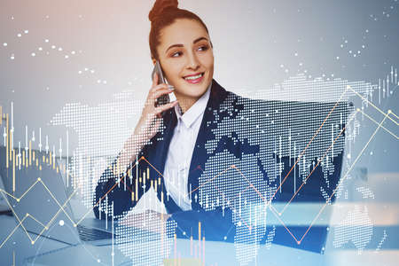 Businesswoman trader talking phone. Stock market changes, business candlesticks graph chart. Double exposure of earth map and lines. Concept of internet tradingの写真素材