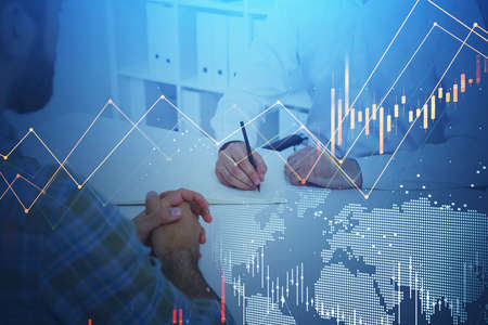 Businessman with pen in hand writing, business agreement. Stock market changes, business...