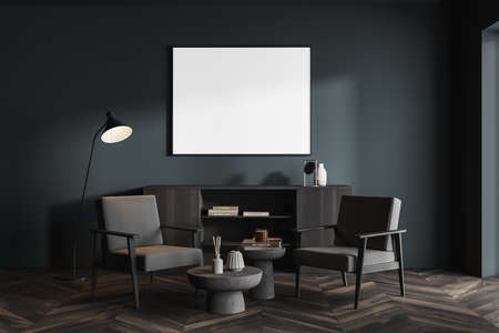 Blue living room interior with two gray armchairs and coffee table, lamp and drawer with decoration....