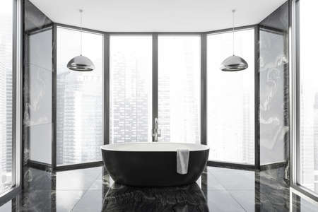 Modern Bathroom interior in new luxury home. Stylish hotel room. Open space area. Marble walls and floor. Black bathtub. Panoramic window. 3d rendering.の写真素材