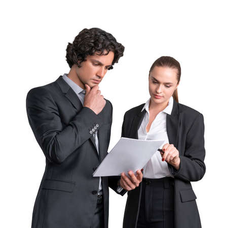 Handsome businessman and attractive businesswoman in formal wear working together on the project, isolated on white background. Concept of success in career. Law firmの写真素材