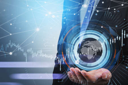 Businessman, trader holding a hand to make a prediction about stock market behavior, forecast and business report hologram. Business and financial success concept. Hologram globeの写真素材