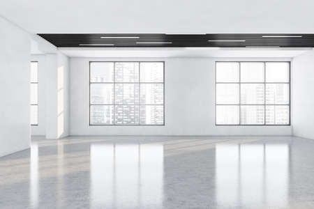 White and wooden large empty office room in business center with two big windows with city view on...