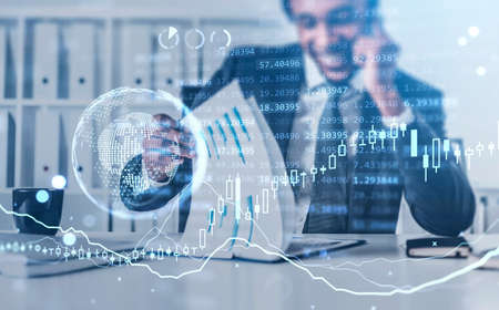 Office african man smiling talk on the smartphone, earth hologram and numbers, chart and background of office room. Double exposure of lines and graphs. Concept of online traderの写真素材