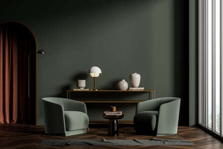 Classic dark green living room interior with wooden floor, two comfortable armchairs and cabinet...