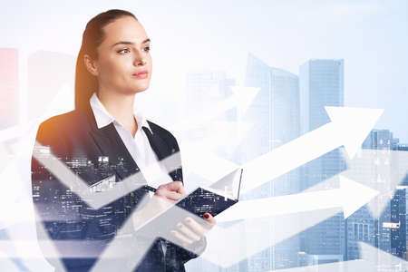 Office woman manager writing in notebook, concentred look. Double exposure with white growing market...
