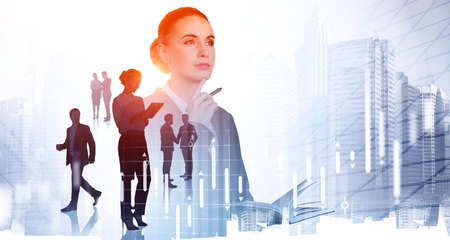 Office people working together, woman with notebook pensive look. Double exposure with stock market forex candlesticks and skyscrapers. Concept of financial analysisの写真素材
