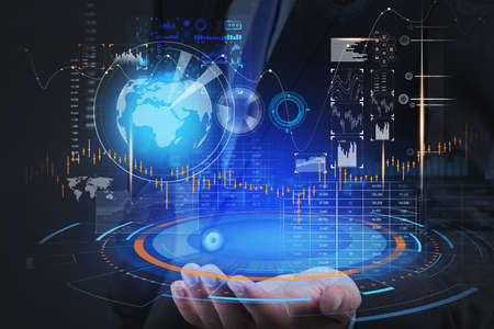 Man hand with stock market statistics, blue and orange hologram with candlesticks, big data...