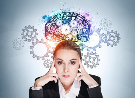 Boss woman in suit thinking hard, plan making. Cogwheels and gears on blue wall, bright creative...