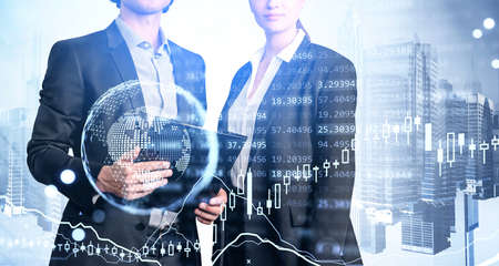 Office woman and man standing with business report, double exposure with stock market chart dynamics...