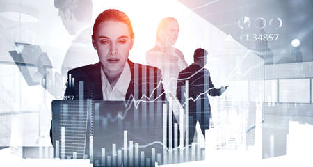Portrait of attractive woman analyst who is carrying out a research of financial data for investment...