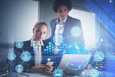 Business people working together to research potential candidates for corporate work. Social media...