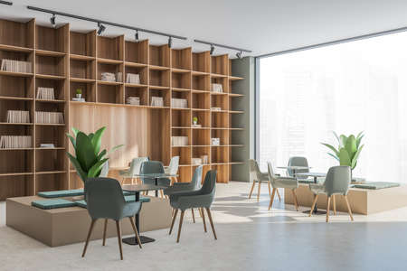 Corner view on the large shelving with empty space in the niche desk and beige and green panoramic...