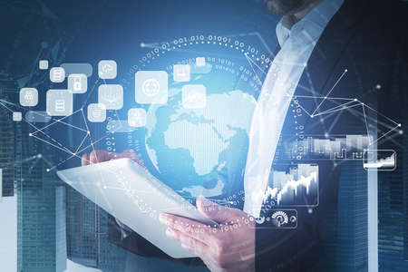 Businessman wearing formal suit is touching a tablet with digital interface with globe, cloud data,...