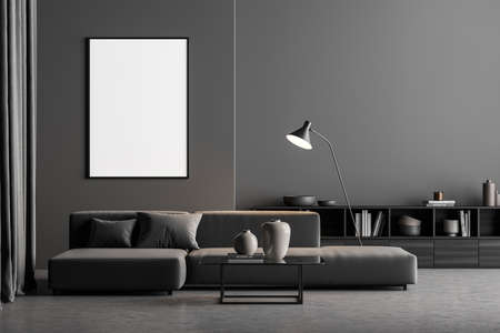 Empty poster on the wall of minimalist gray living room with sofa below, floor lamp, coffee table and sideboard. Concrete floor. A concept of modern house design. Mockup. 3d renderingの写真素材