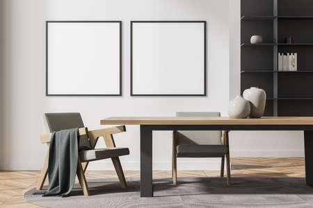 Living room interior with two white empty poster, armchairs, table and wooden parquet floor. Concept...