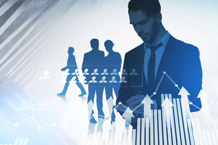 Group of business people work together taking notes in notebook. Digital interface with bar diagram,...